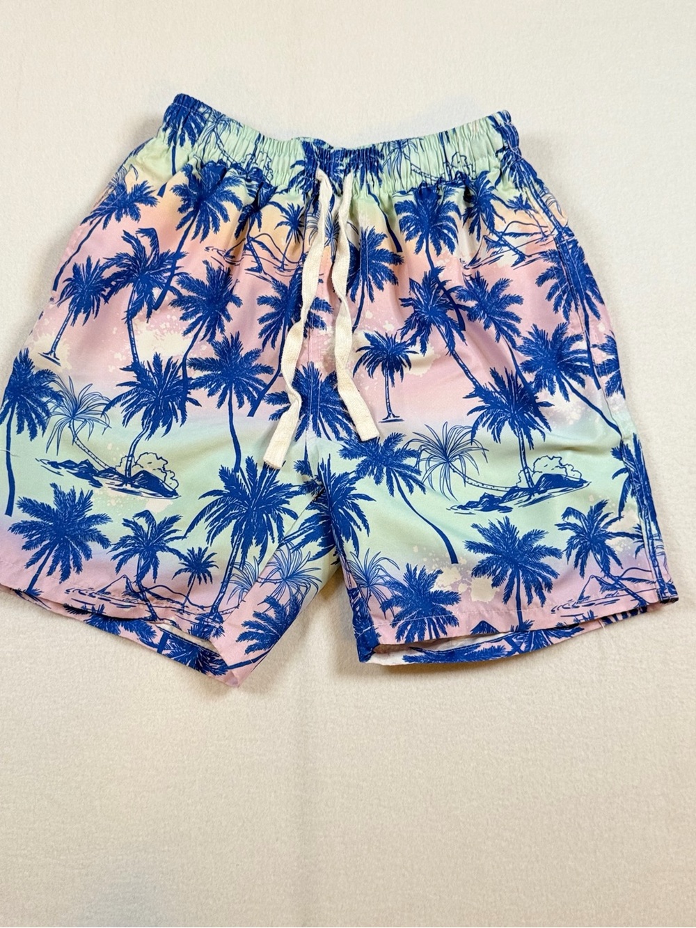 Kids Palm-Print Swim Trunks in Pastel Blue & Pink